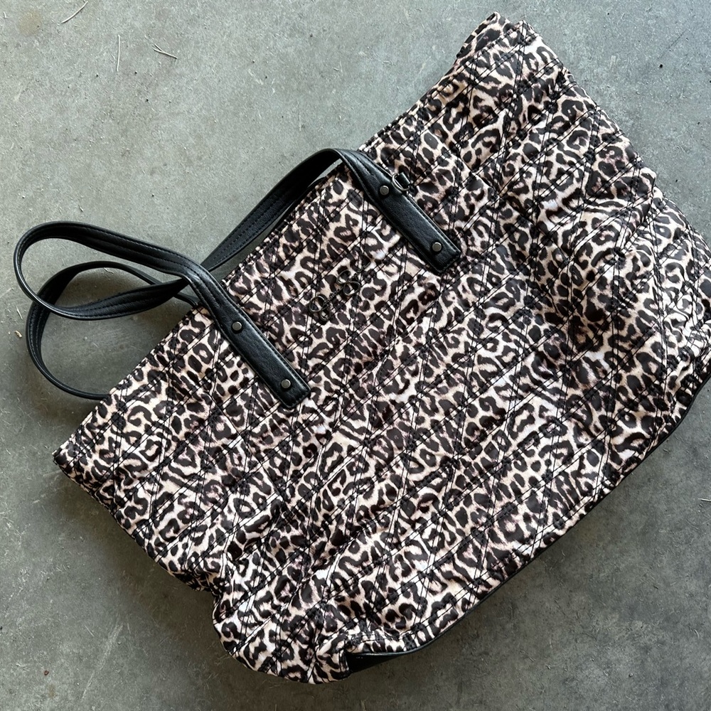 Woman’s cheetah purse or overnight bag